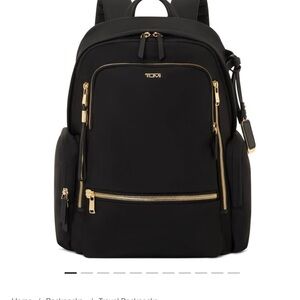 Tumi Black Backpack with Gold Details